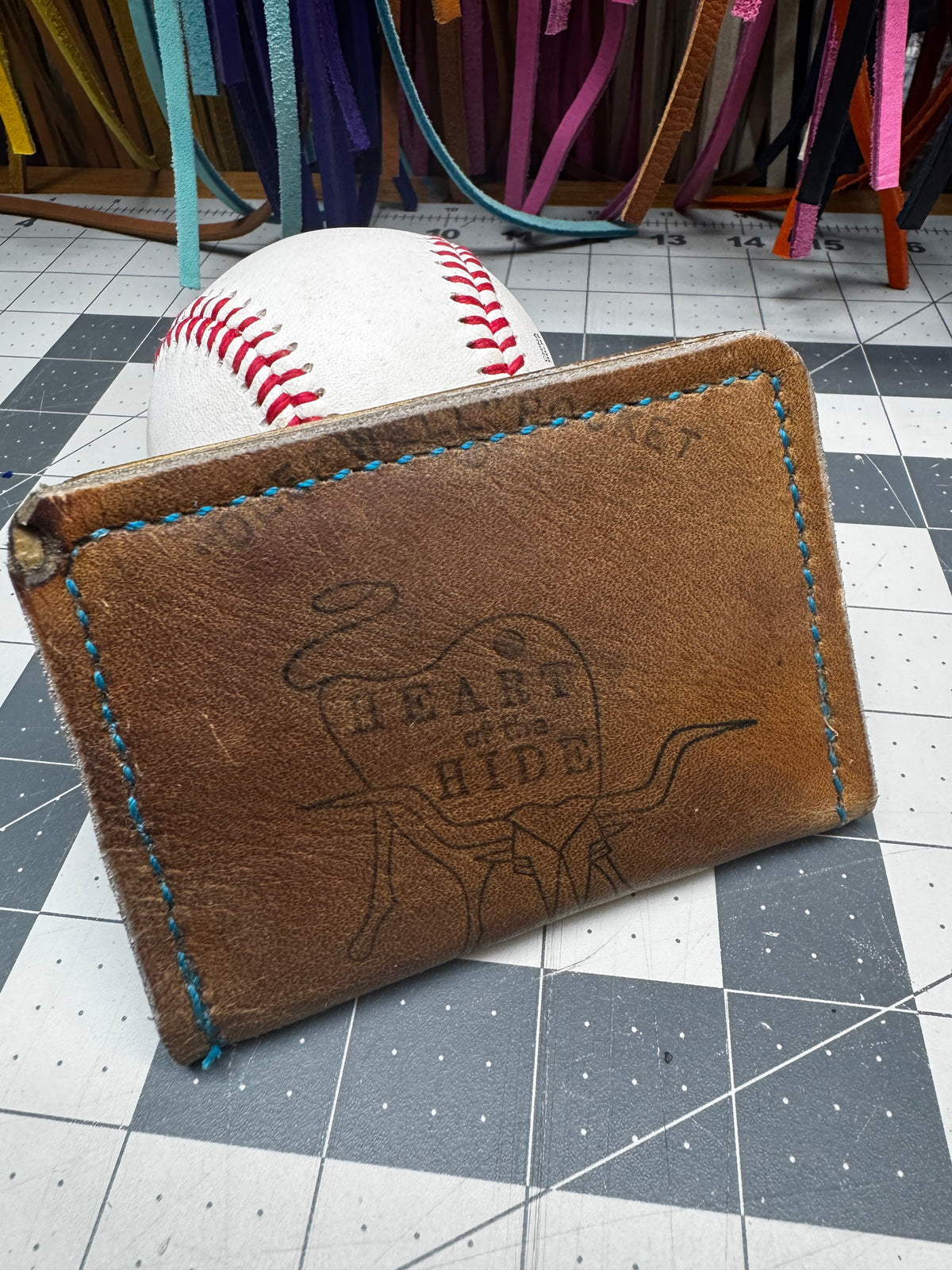 Rawlings Heart of the Hide baseball glove leather wallet detail