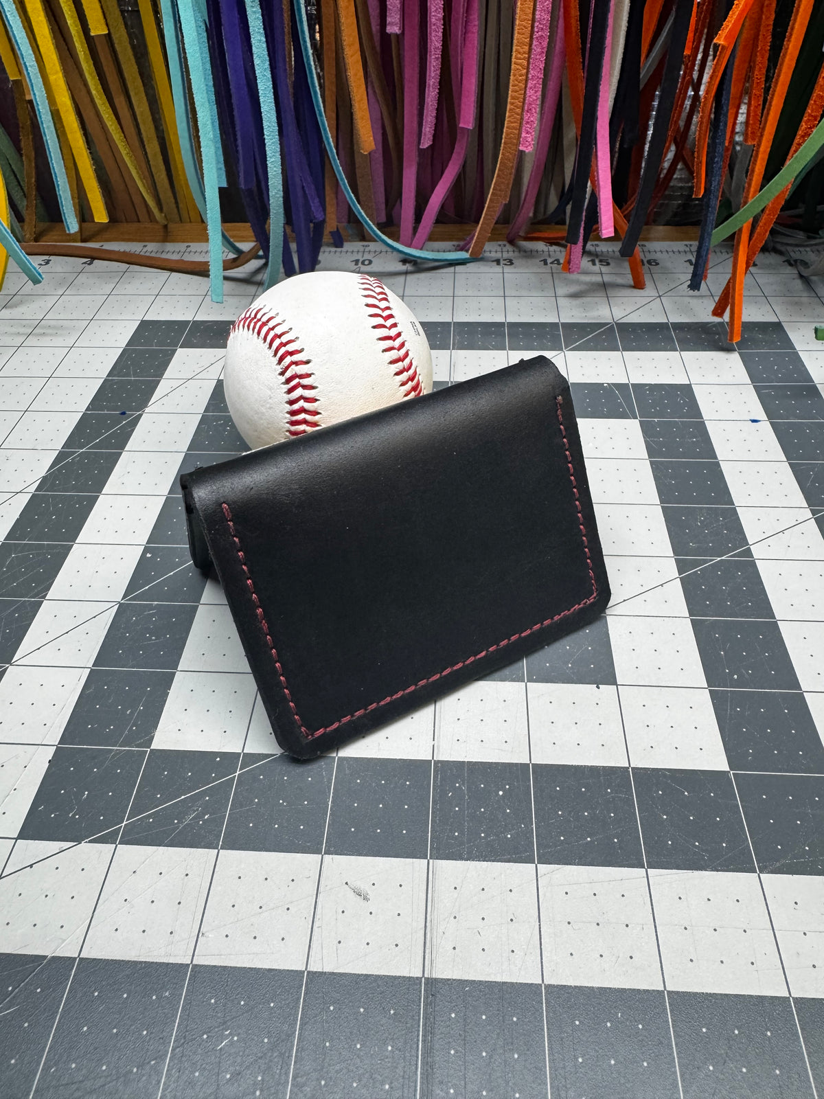 Handmade black leather Rawlings baseball wallet with gold patch