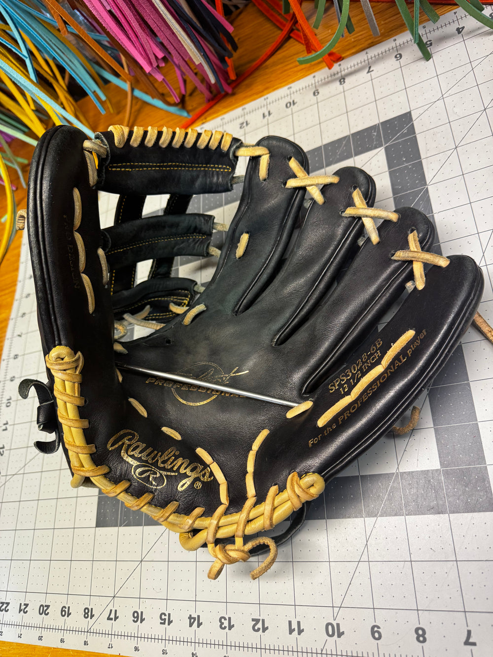 
            Rawlings Select Professional before Clean, Condition & Relace
          